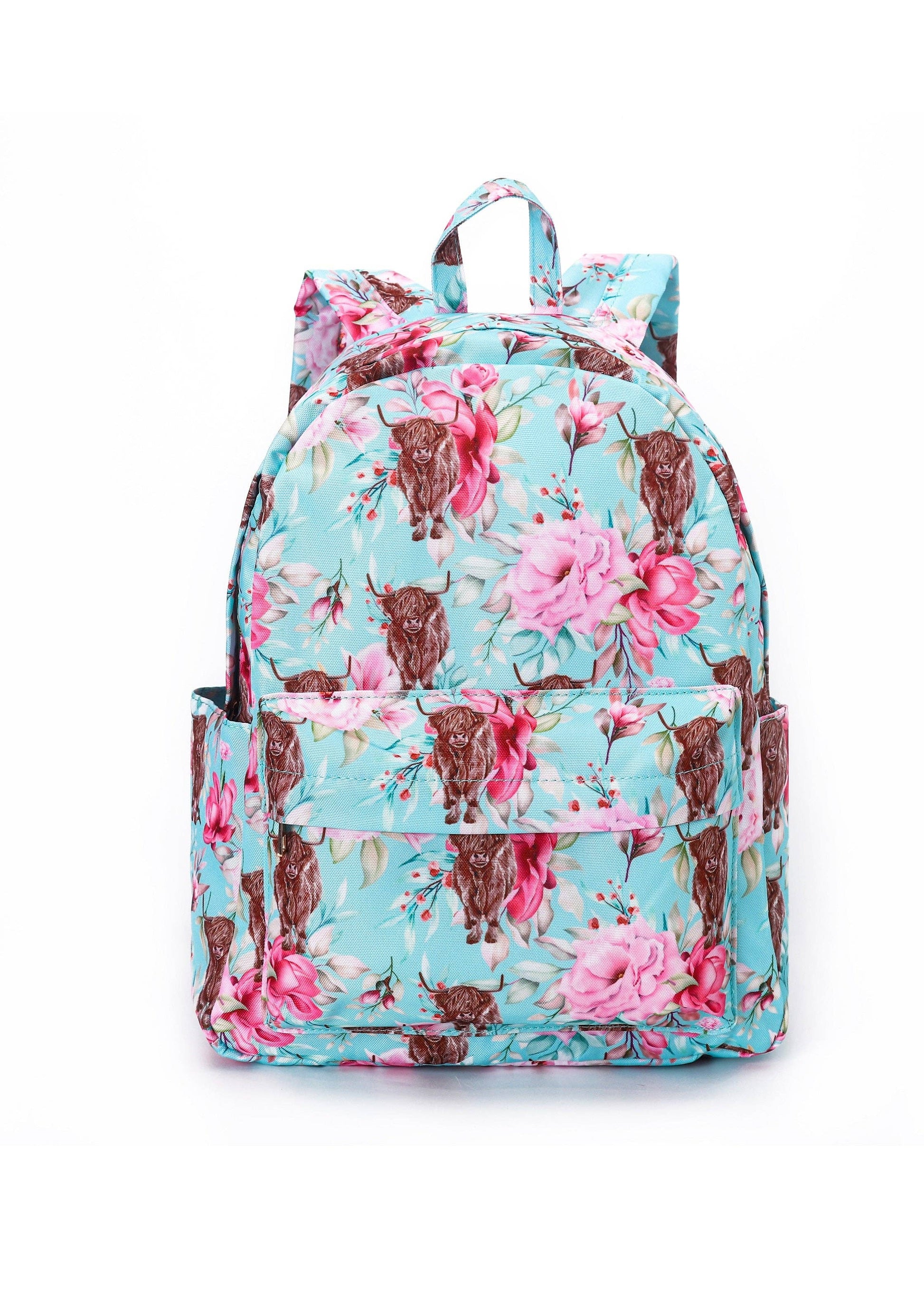 Floral and cow patterned backpack on a baby blue background